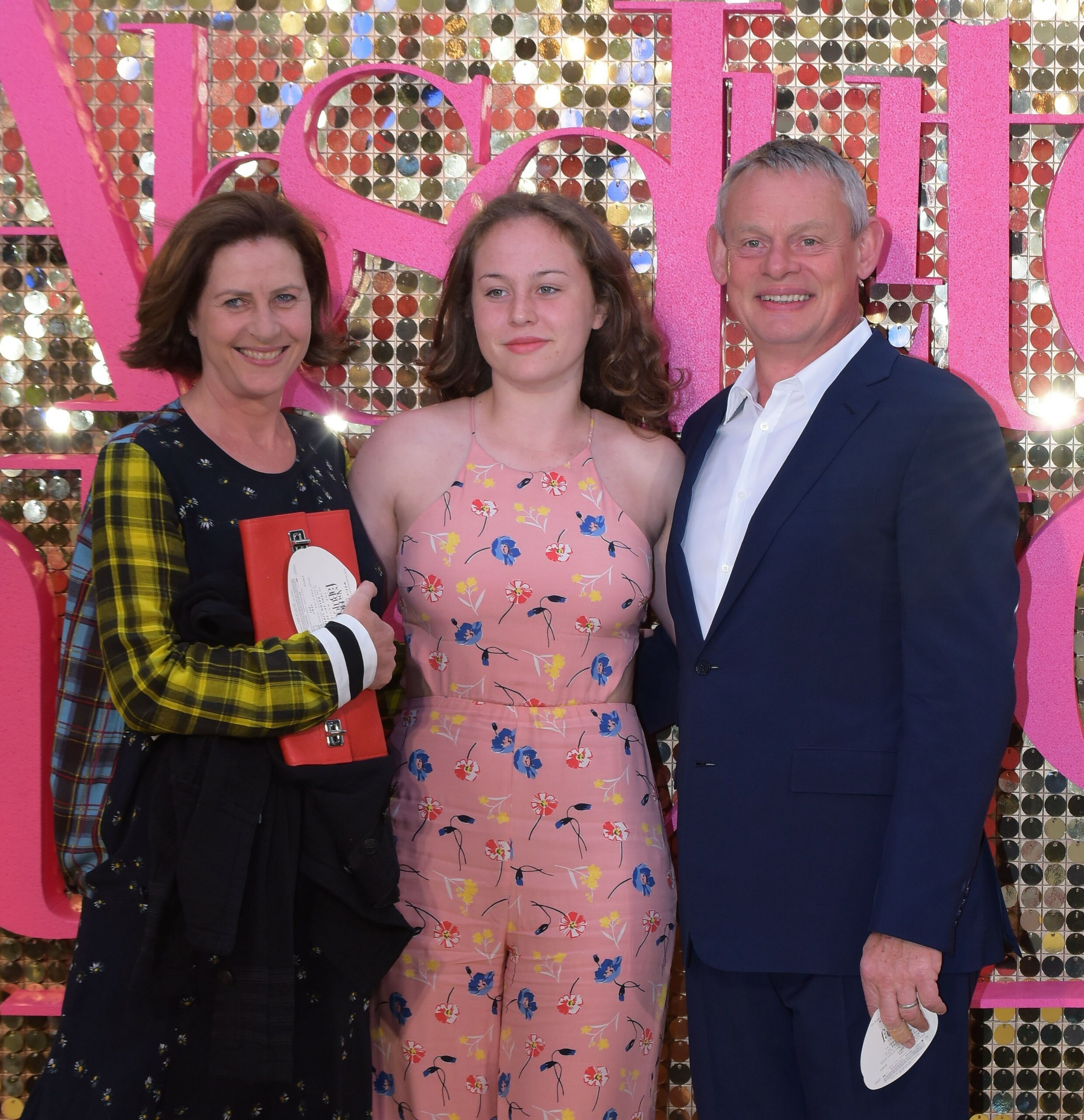 Martin Clunes at event with his wife and daughter