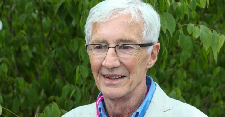 Paul O'Grady smiling at Chelsea Flower Show