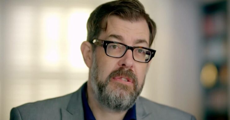 Richard Osman speaks to the camera