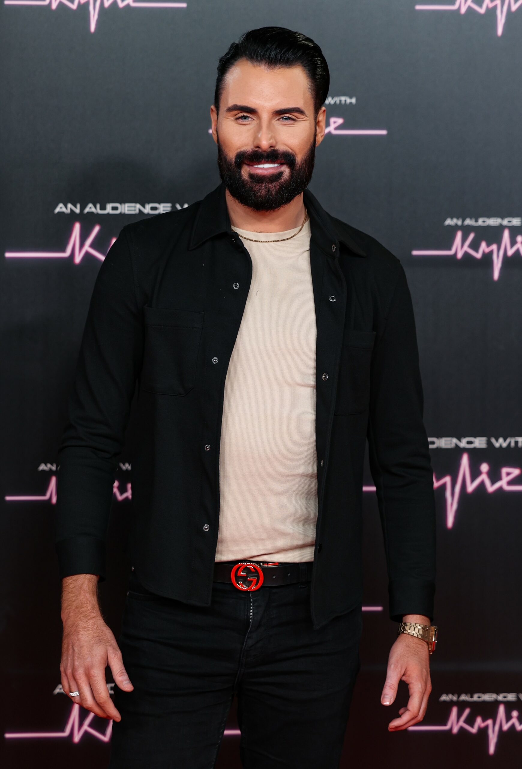 Rylan Clark smiling at event