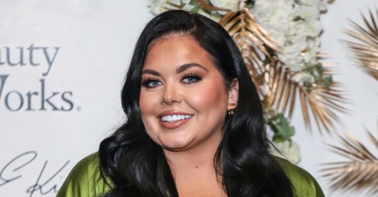 Scarlett Moffatt smiles at event