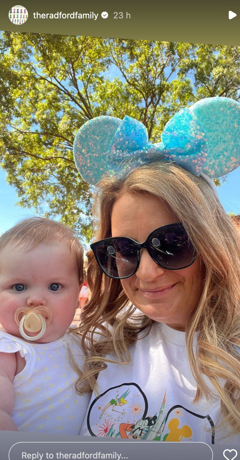 The Radford family on holiday, 22 Kids & Counting Sue Radford on holiday in Disneyland wearing Minnie mouse ears and holding baby