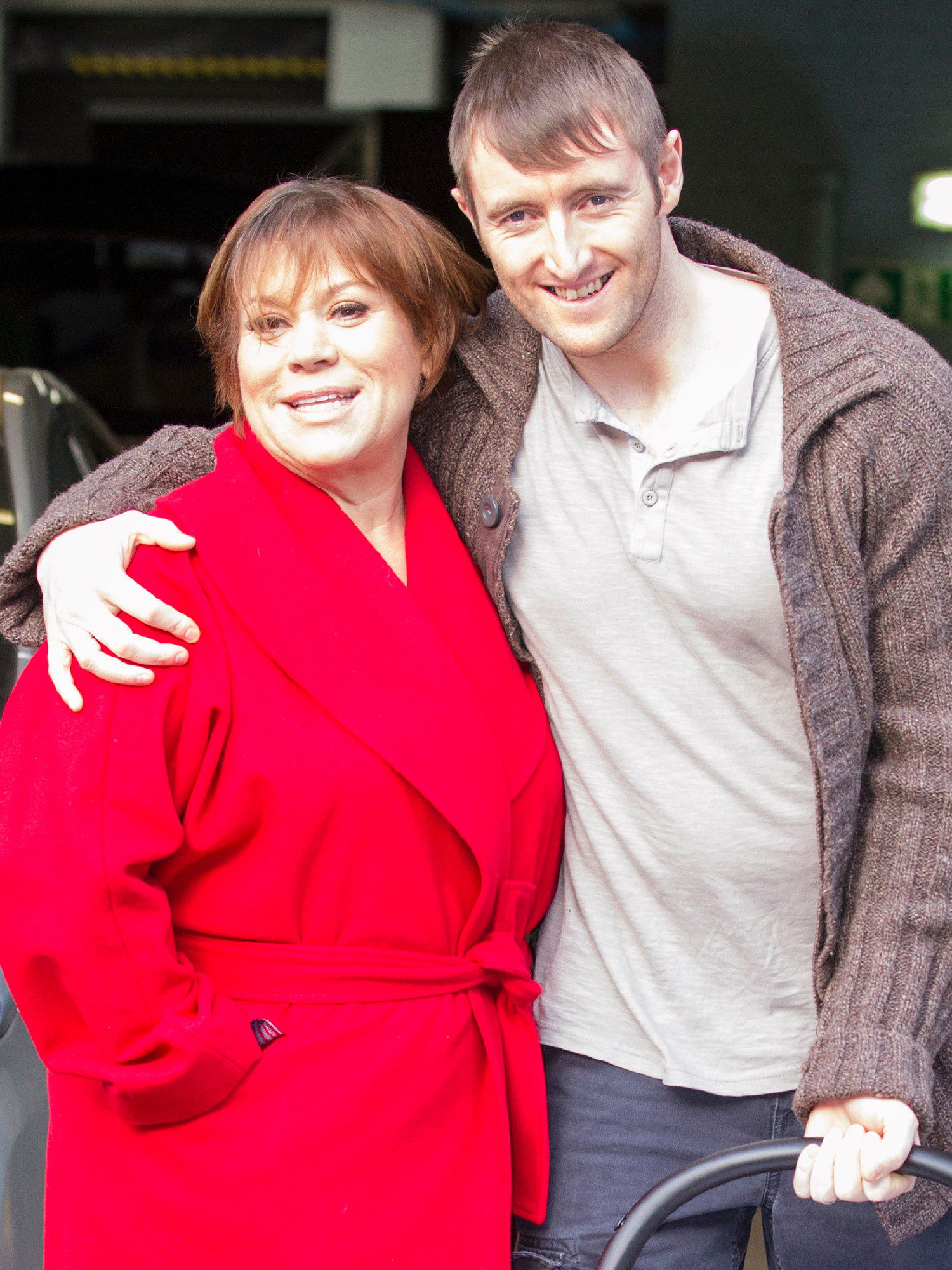 Tina Malone smiling with husband Paul Chase