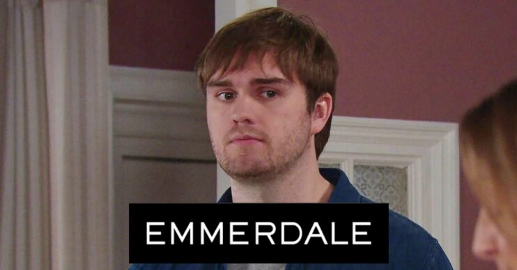 Tom King looking moody on Emmerdale with soap logo (Credit: ITV/Composite: ED!)