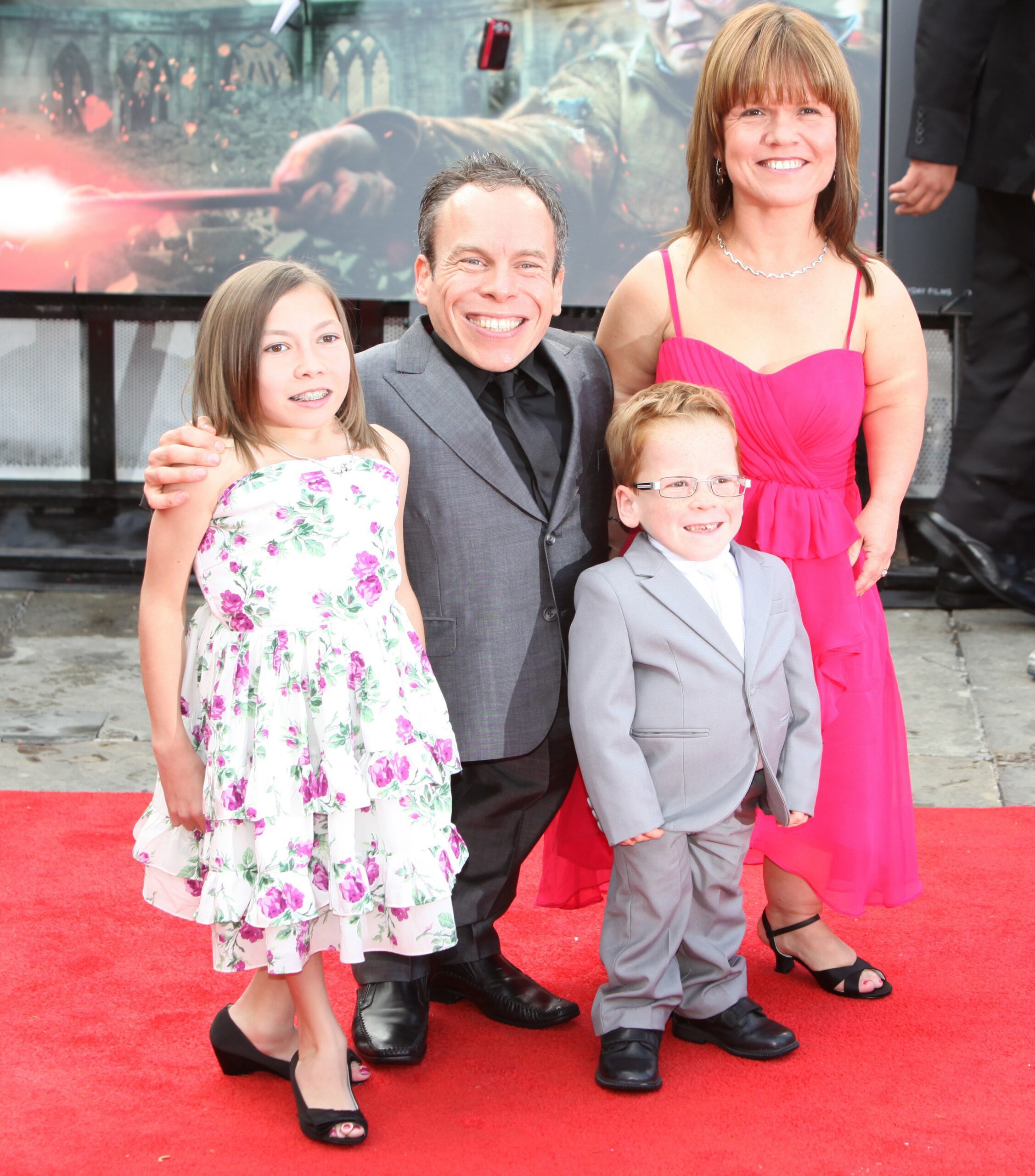 Warwick Davis with his wife Samantha and children at film premiere