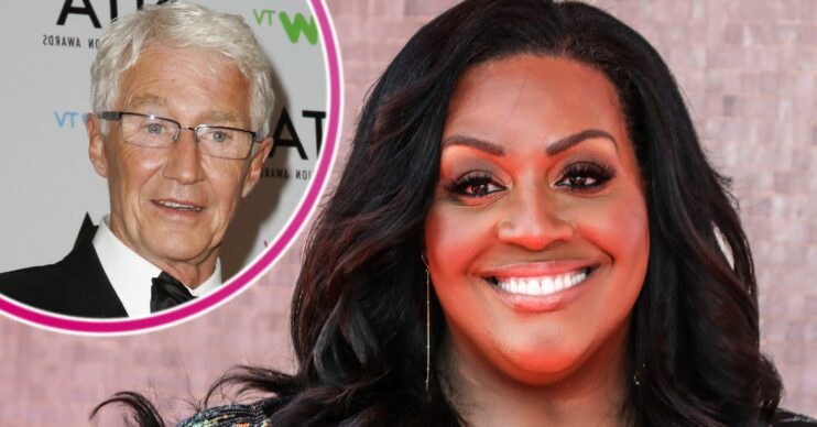 Paul O'Grady smiling with Alison Hammond