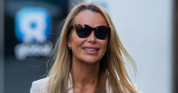 Amanda Holden smiling in sunglasses