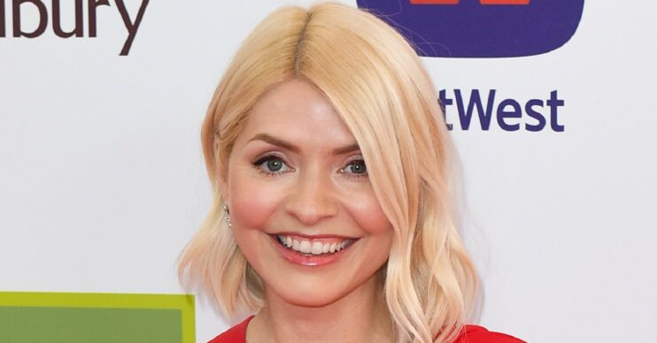 Holly Willoughby posing on a red carpet