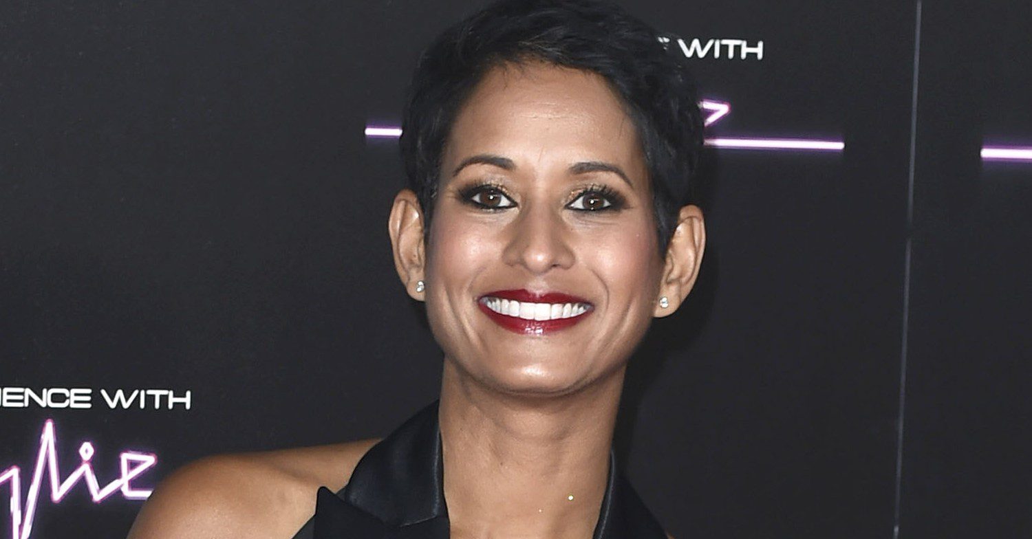 Naga Munchetty smiling at a press event