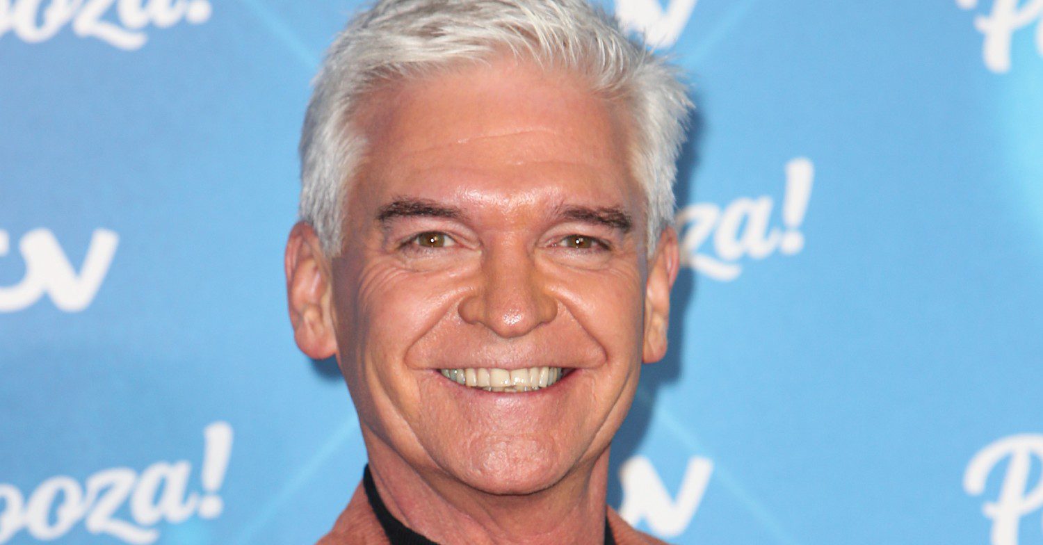 Phillip Schofield smiling on a red carpet