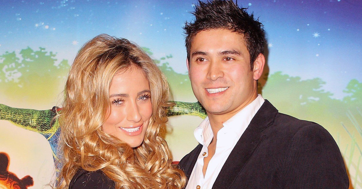 Chantelle Houghton and Rav smiling on a red carpet 