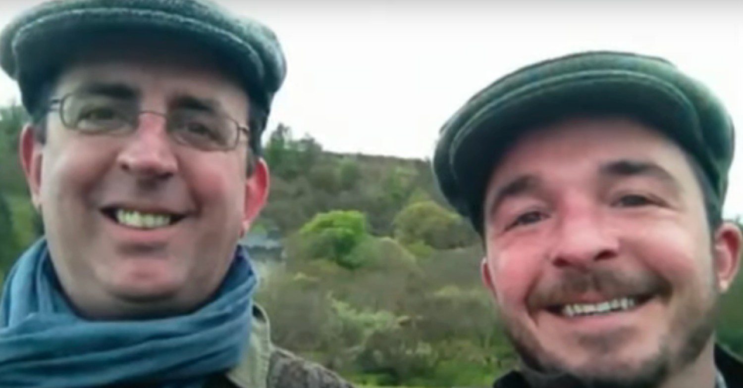 Richard Coles and David smiling in a selfie while out for a walk