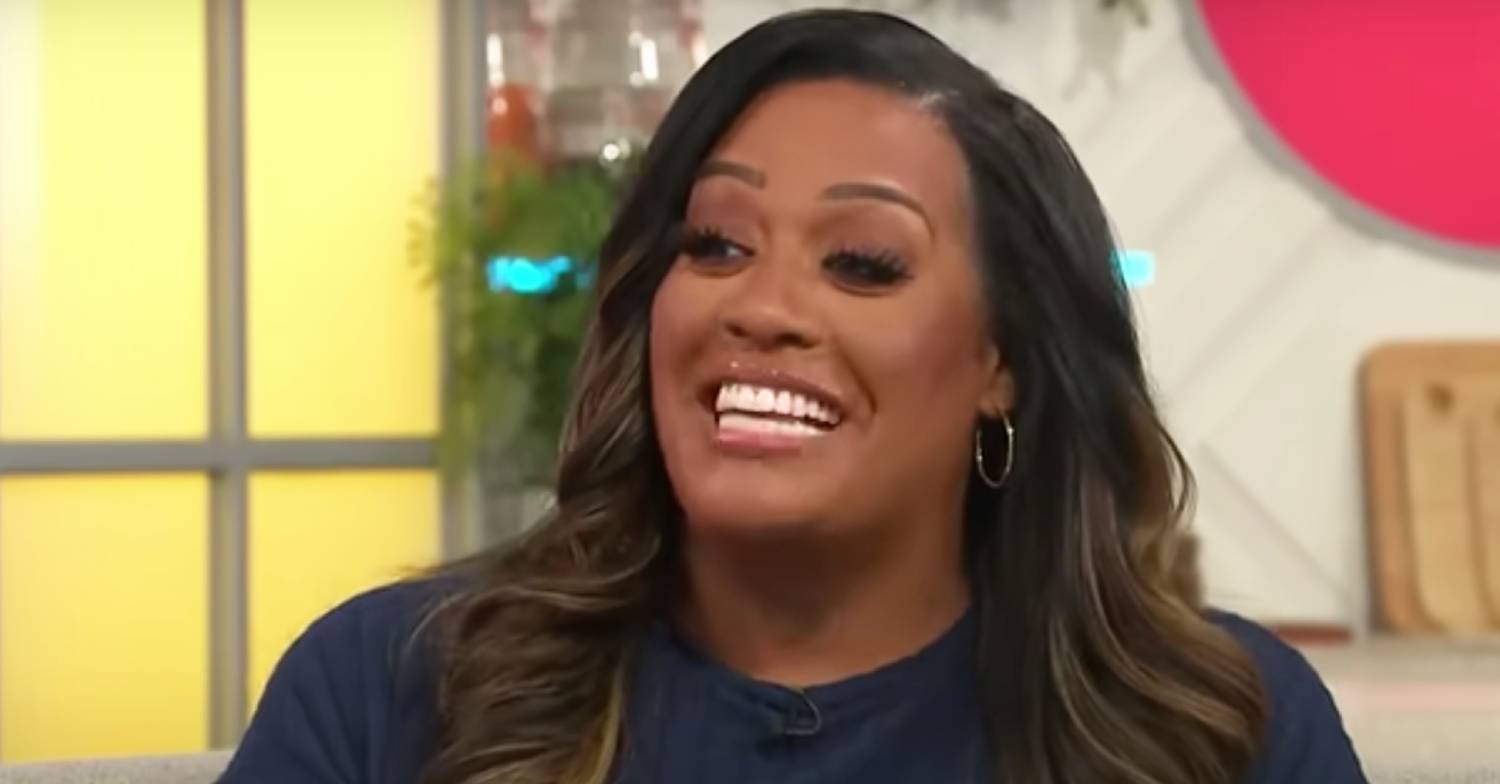 Alison Hammond beams widely
