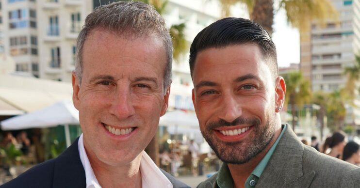 Anton Du Beke smiling beside Giovanni Pernice