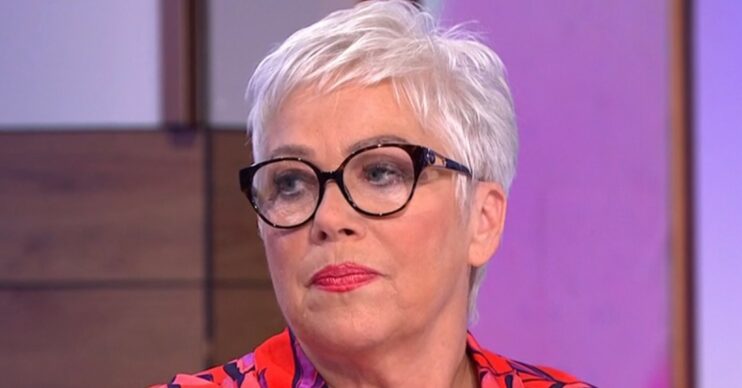 Denise Welch rant on Loose Women wearing patterned shirt and glasses with saddened expression
