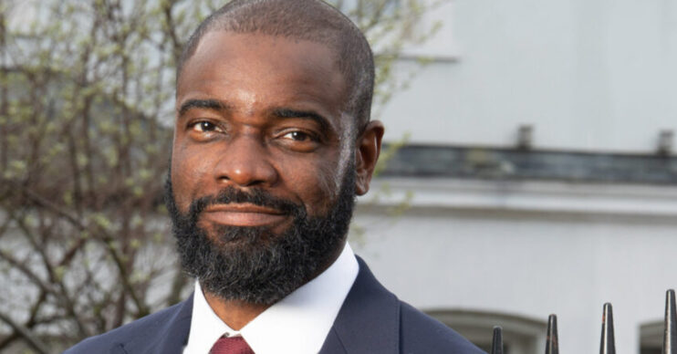 EastEnders' Junior is smiling in a promo photo