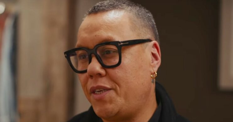 Gok Wan looking sad wearing glasses