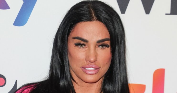 Katie Price close-up with neutral expression and long black hair