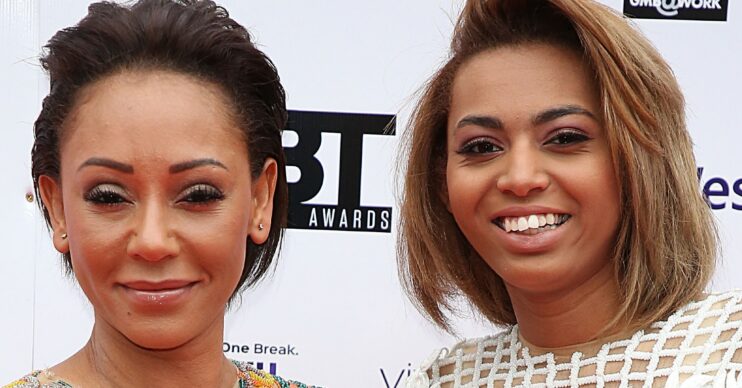 Mel B smiling beside daughter Phoenix Chi