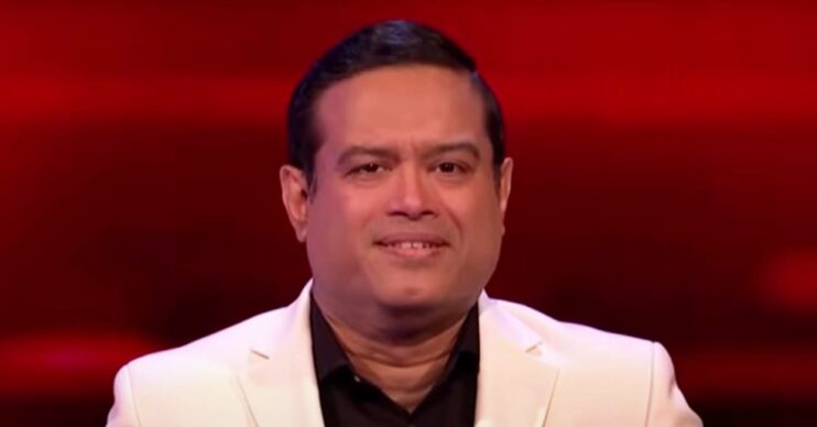 Paul Sinha smiles