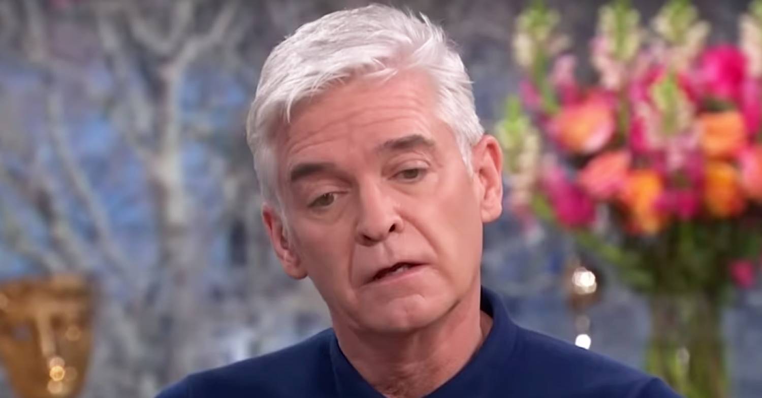 Phillip Schofield looks downwards
