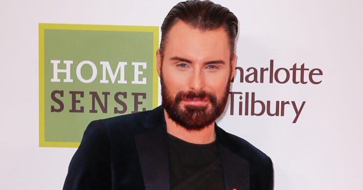 Rylan Clark posing at event