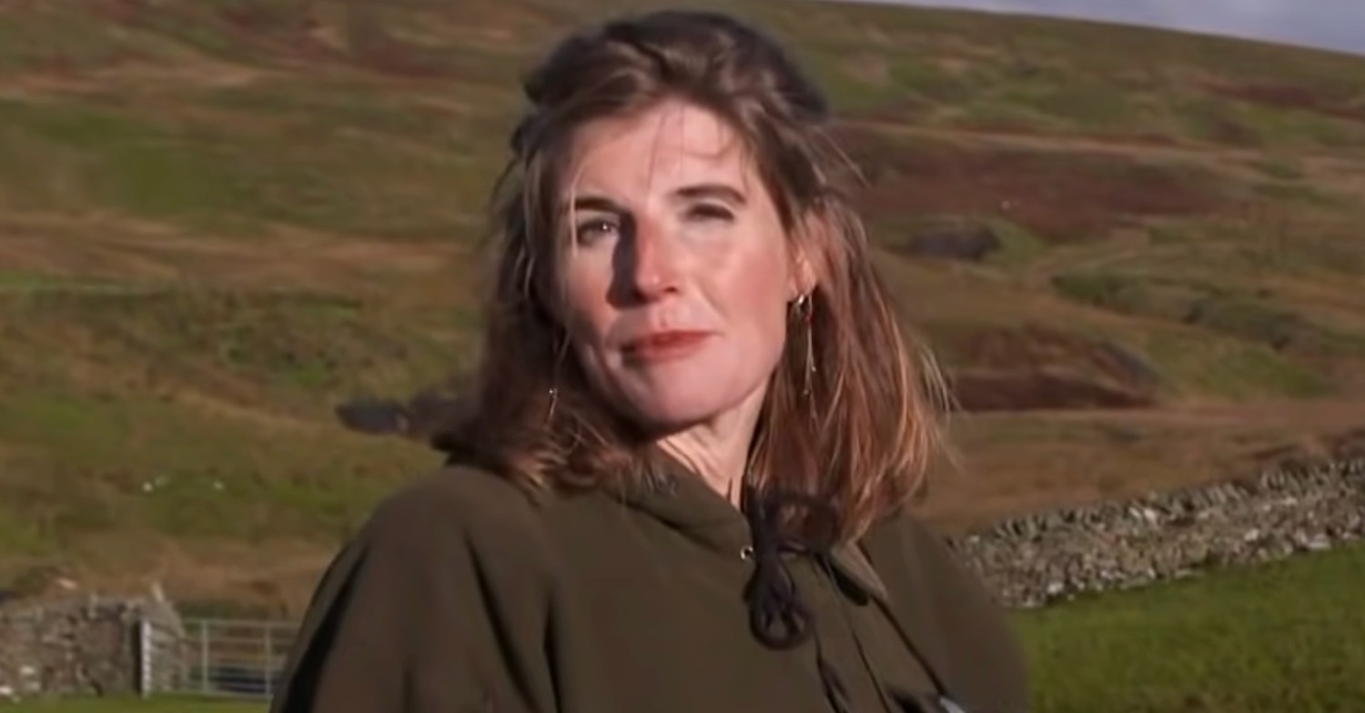 Amanda Owen speaking to camera while out in the fields