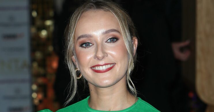 Rose Ayling-Ellis smiling at a press event