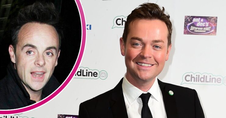 Stephen Mulhern smiling and Ant McPartlin looking up