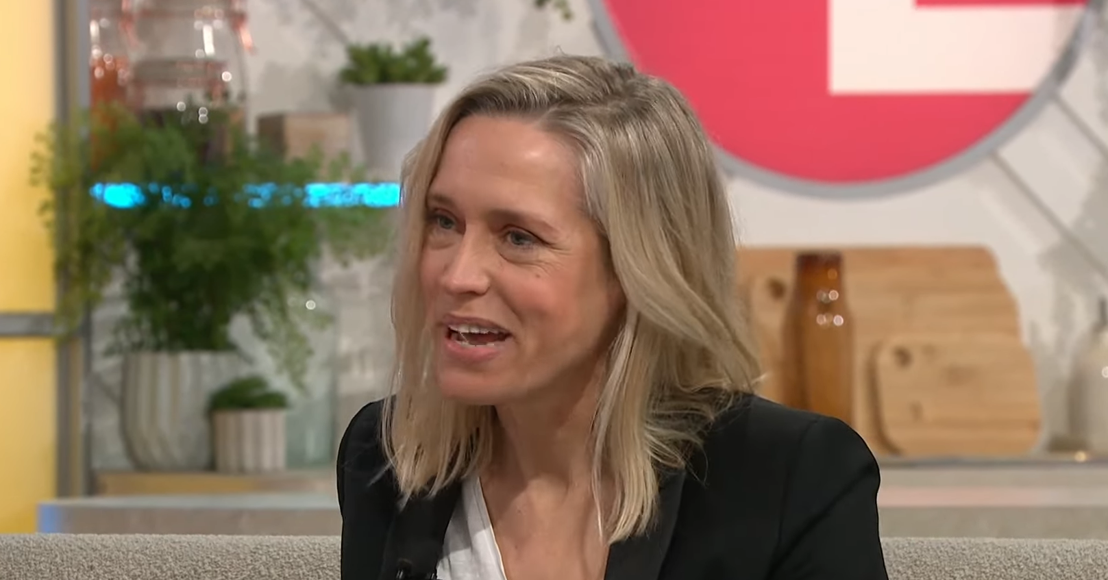 Beth Cordingly smiles on the Lorraine sofa