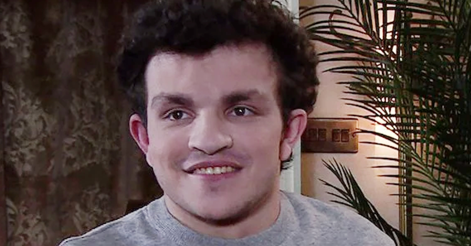Coronation Street's Simon is smiling