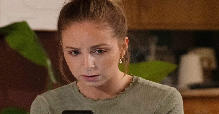 Emmerdale's Belle is on the phone
