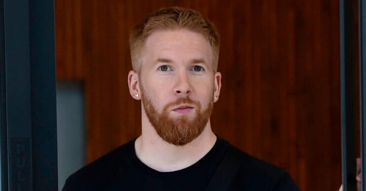 Neil Jones gazing in front