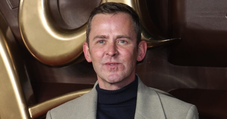Scott Mills smiling at film premiere