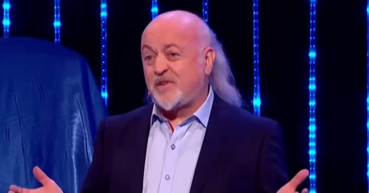 Bill Bailey with his arms outspread