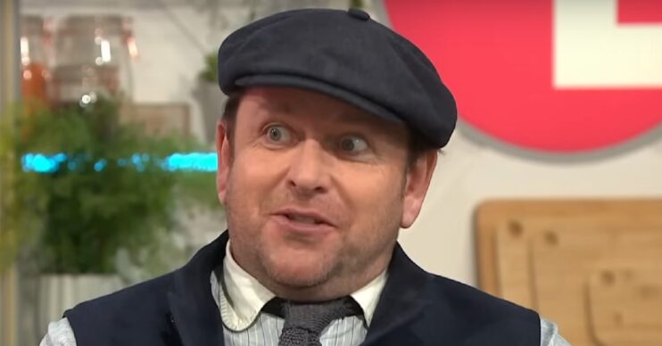 James Martin with wide eyes, wearing a hat on Lorraine