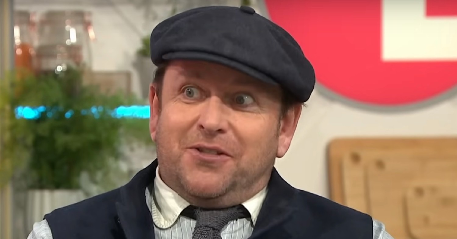 James Martin with wide eyes, wearing a hat on Lorraine