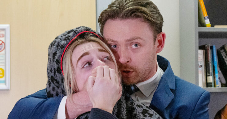 Coronation Street's Joel is covering Lauren's mouth