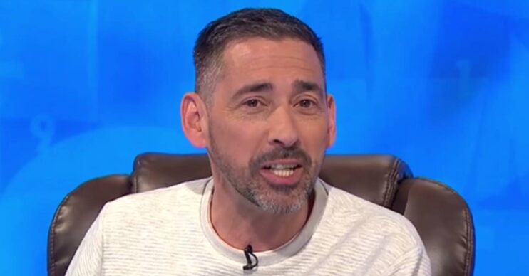 Colin Murray looks at the camera
