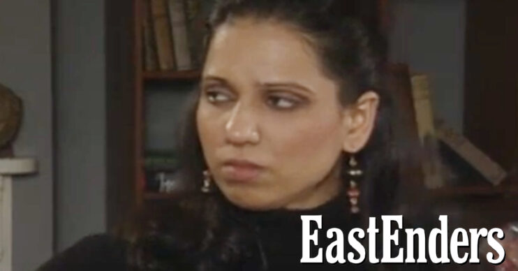 EastEnders' Gita is angry, with the EastEnders logo