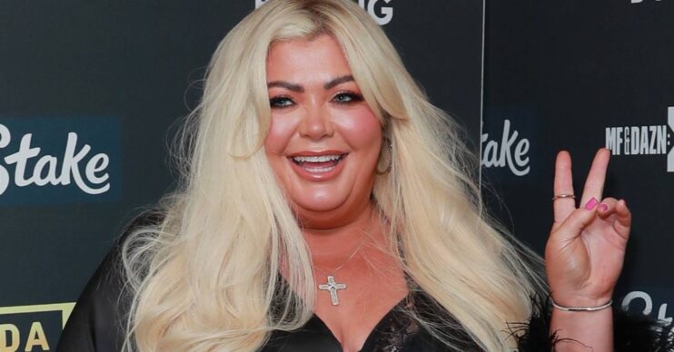 Gemma Collins gives a peace sign