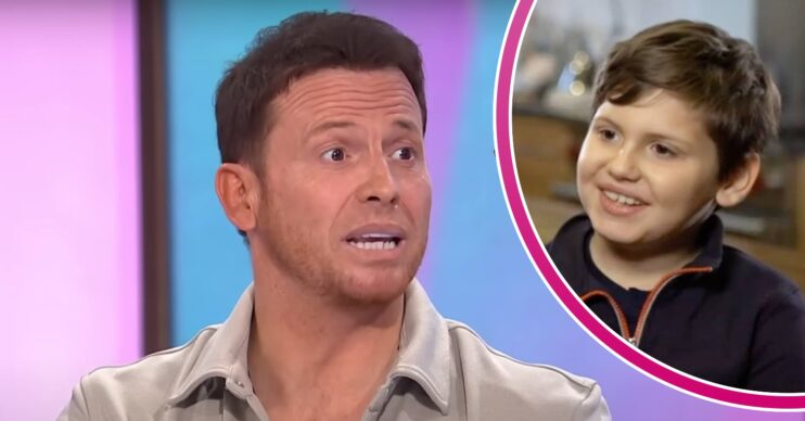 Joe Swash looks animated, his son Harry smiles