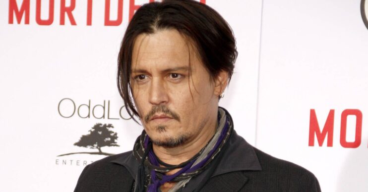 Johnny Depp stares ahead