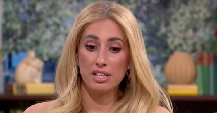 Stacey Solomon looks downwards