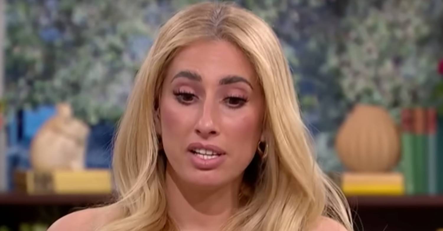 Stacey Solomon looks downwards