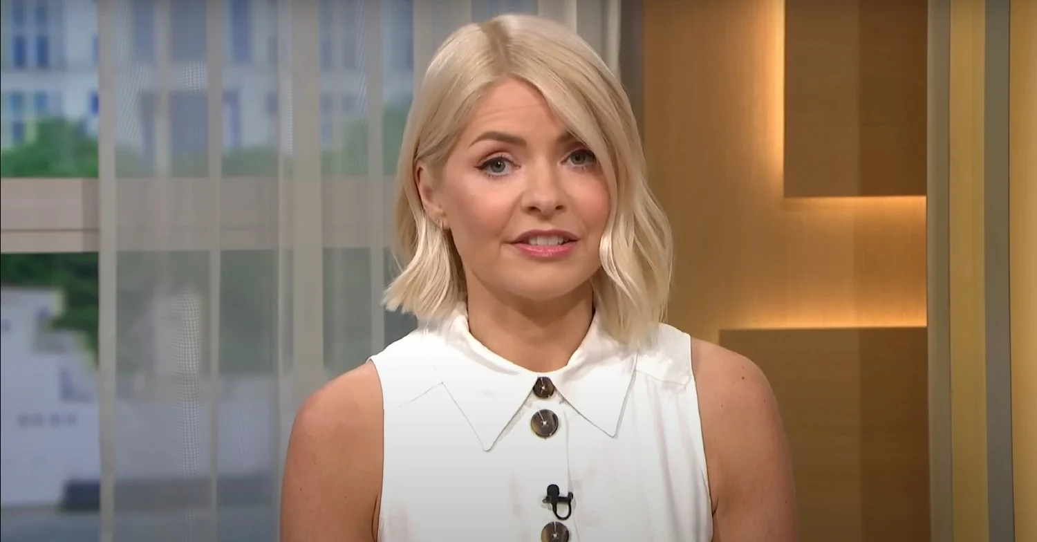 Holly Willoughby wearing a white dress on This Morning