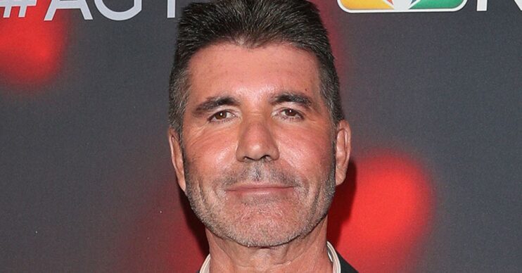 Simon Cowell with a straight-faced expression