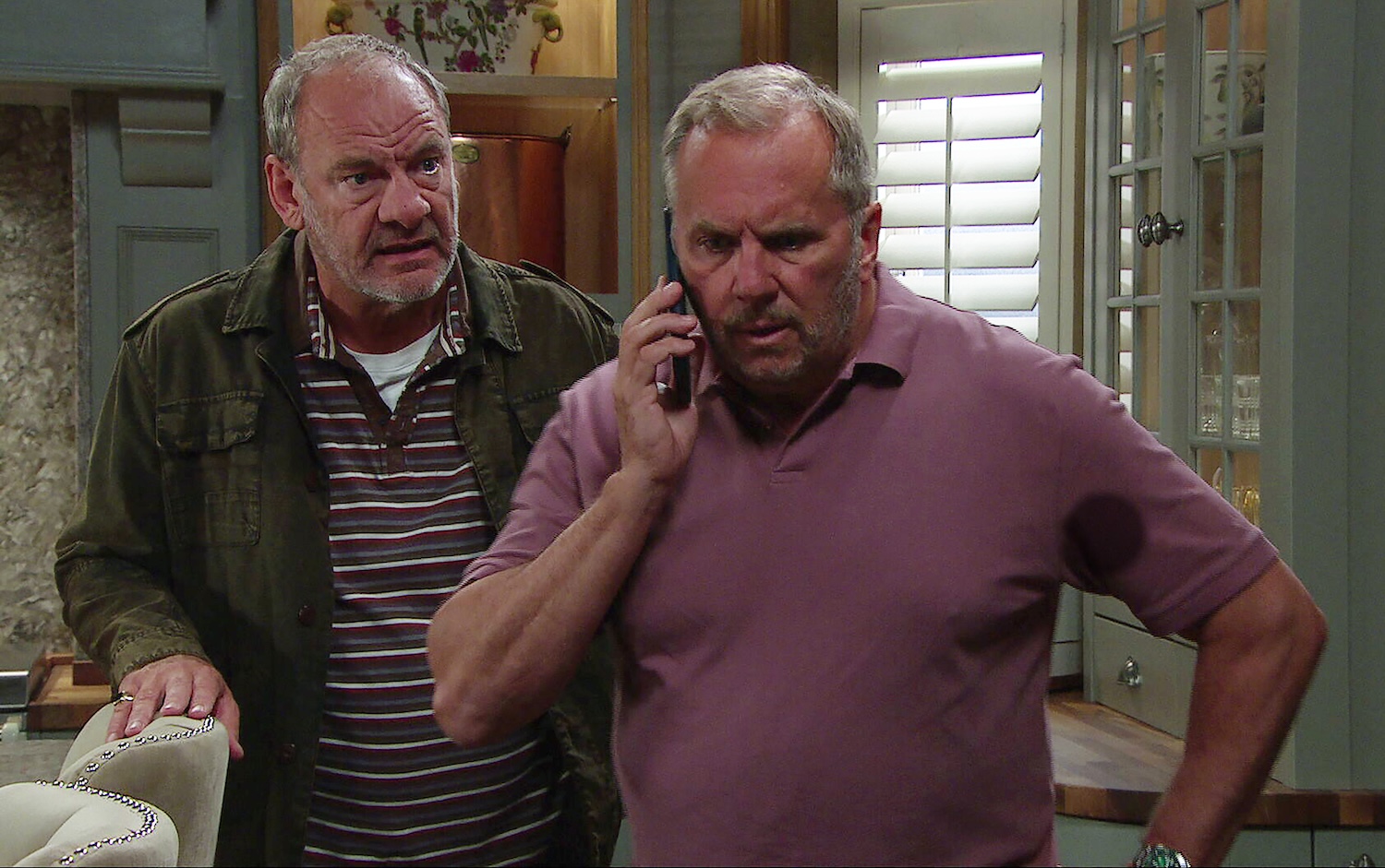 Emmerdale's Jimmy is staring at Will whilst Will's on the phone