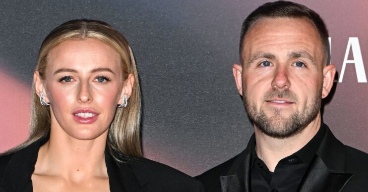 Chloe Kelly and husband Scott smiling
