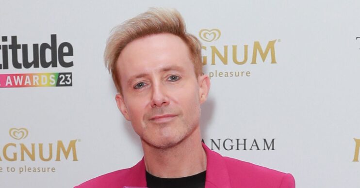 Ian H Watkins smiling